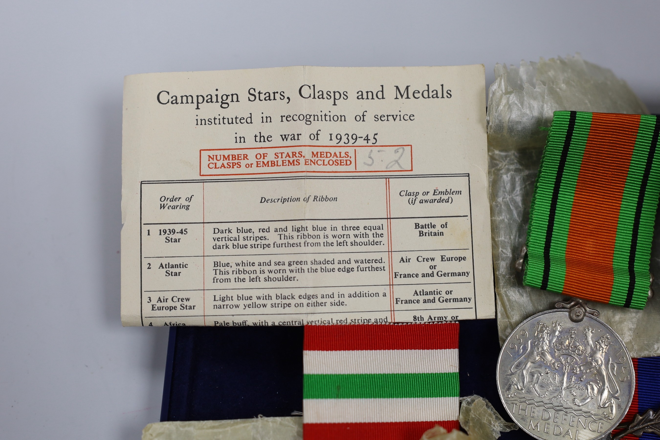 A WWII group of 5 including war medal with oak leaf and 1939-45 star with oak leaf to L.E. TYLER, 8th Army bar (with named box)
